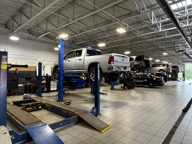 Ram 5500 commercial service truck inside a shop
