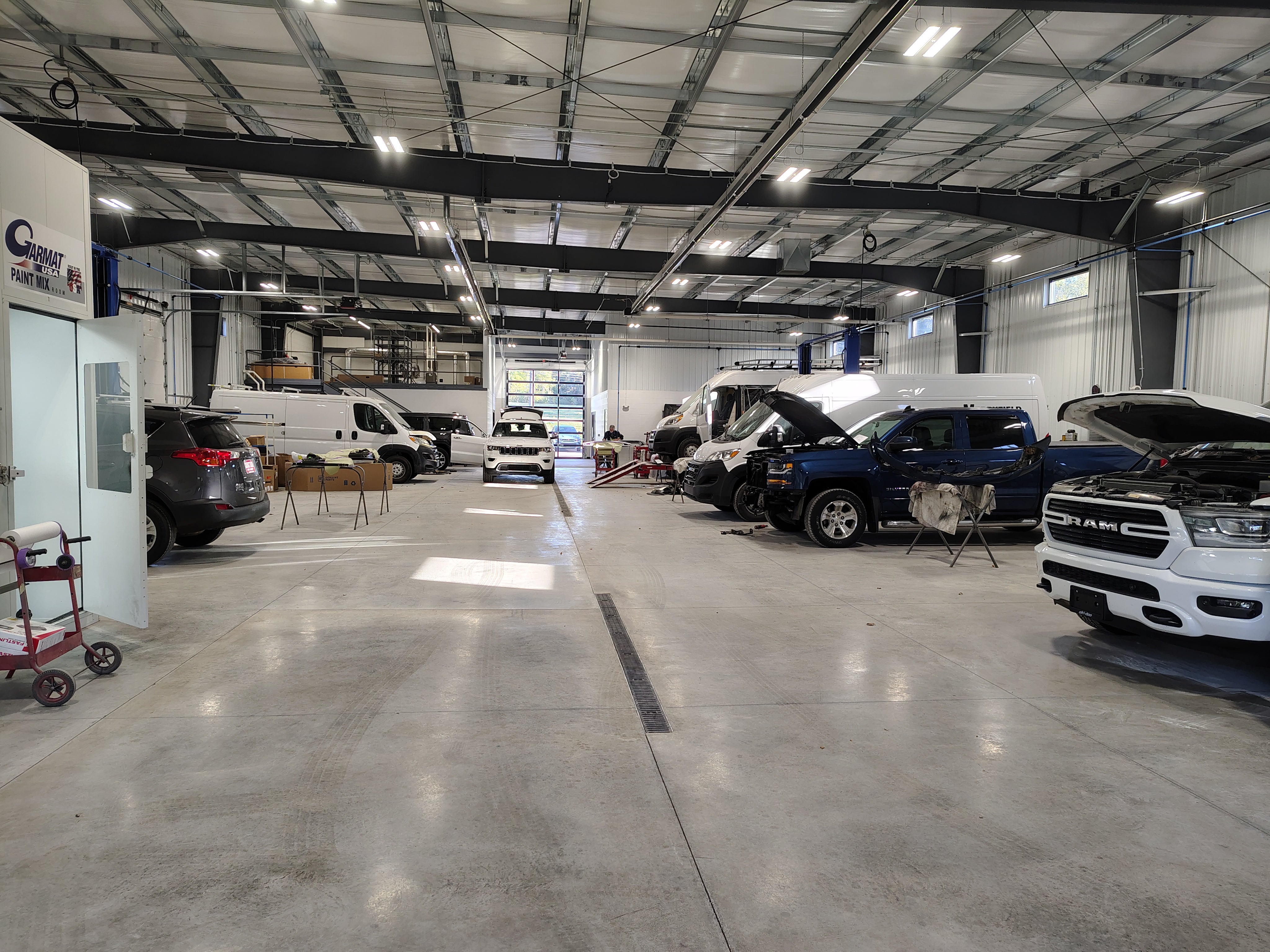 Junction collision repair technicians and shop
