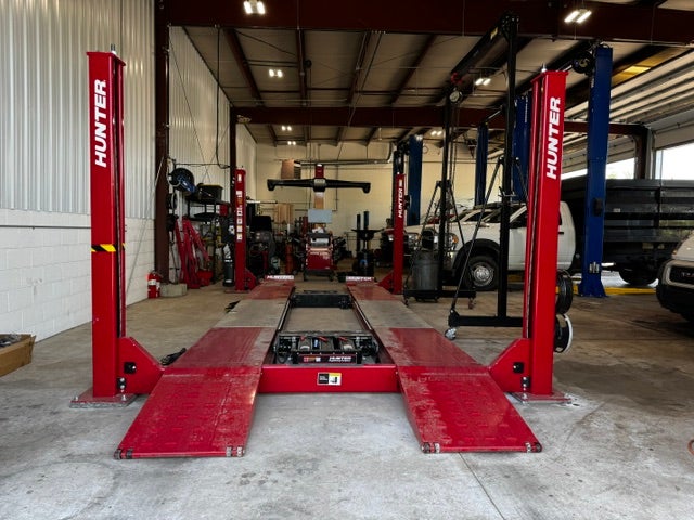 Ram ProMaster commercial van being serviced in a repair bay
